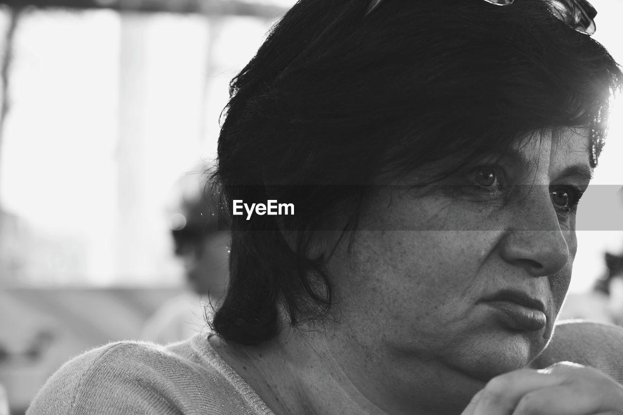 Close-up of woman looking away