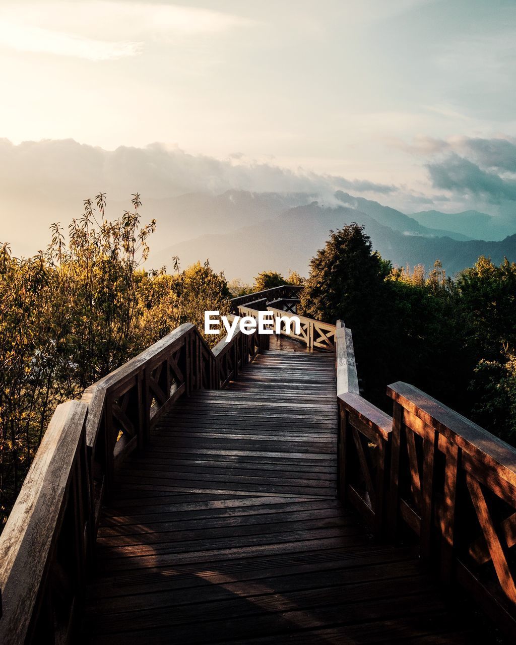 High angle view of empty steps against mountains in morning