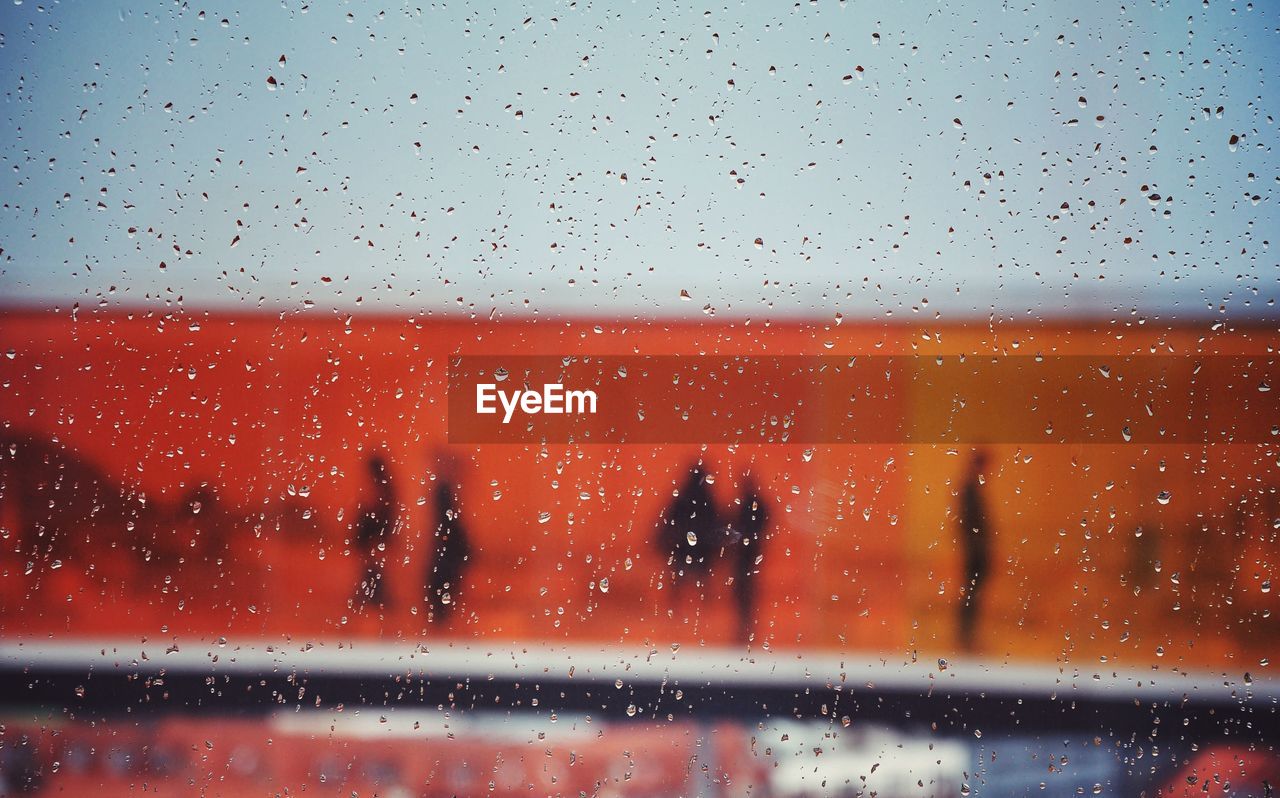 Aros aarhus kunstmuseum seen through wet glass window