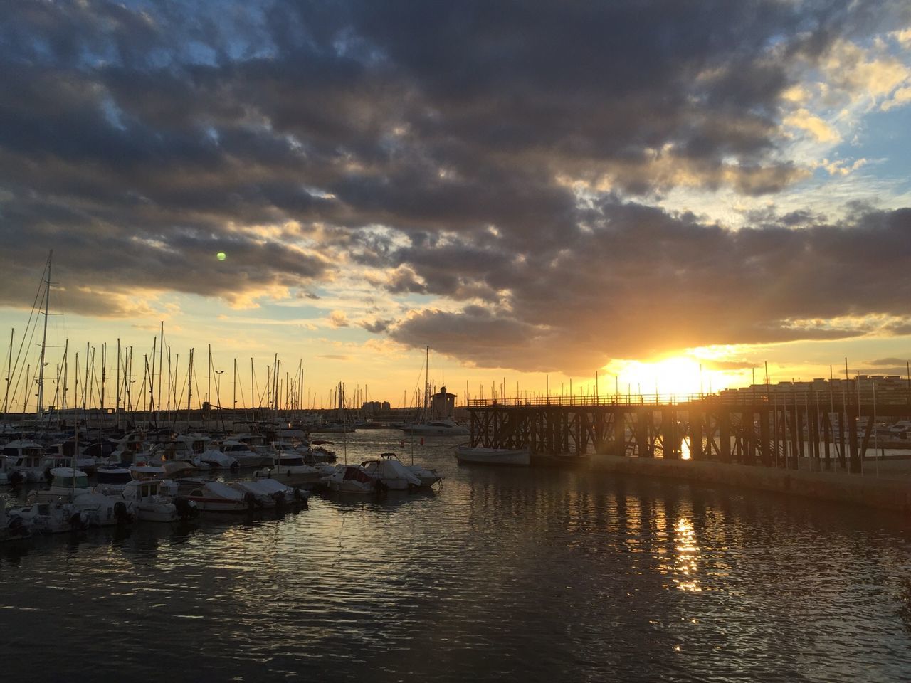 VIEW OF BOATS AT SUNSET