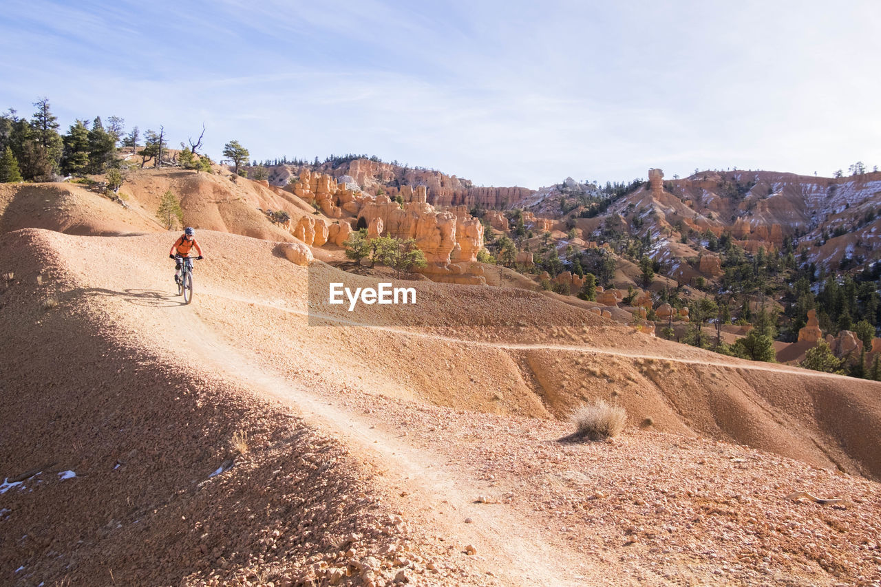 A woman riding the thunder mountain trail.