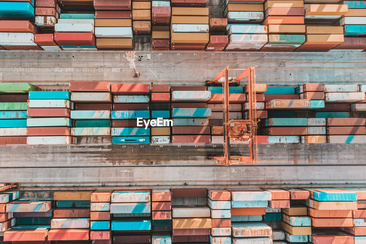 Aerial view of shipping container port terminal. colourful pattern of containers in harbor. maritime