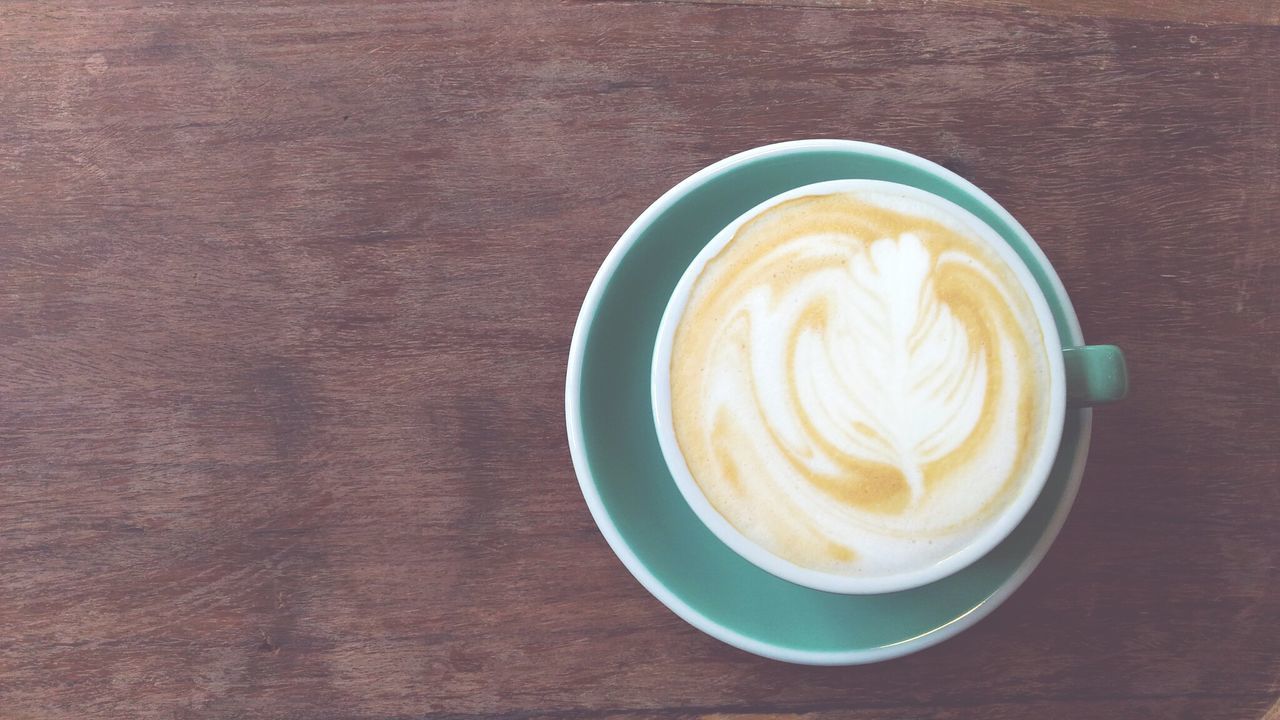 DIRECTLY ABOVE SHOT OF CAPPUCCINO AND COFFEE ON TABLE