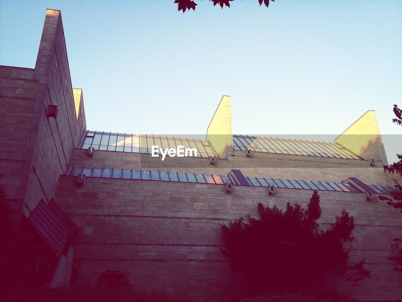 LOW ANGLE VIEW OF TEMPLE AGAINST CLEAR SKY