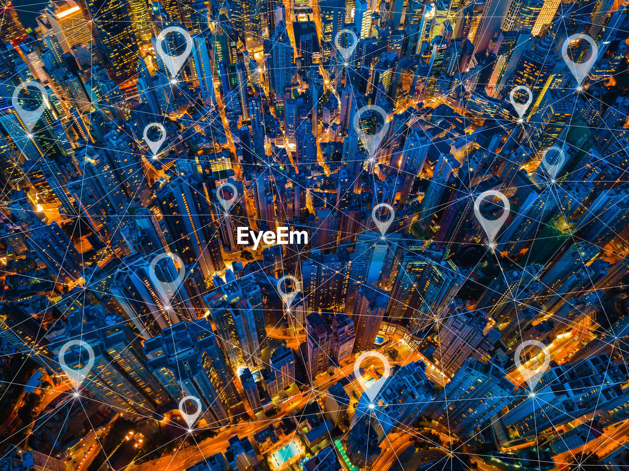 Digital composite image of dots connecting illuminated buildings in city at night