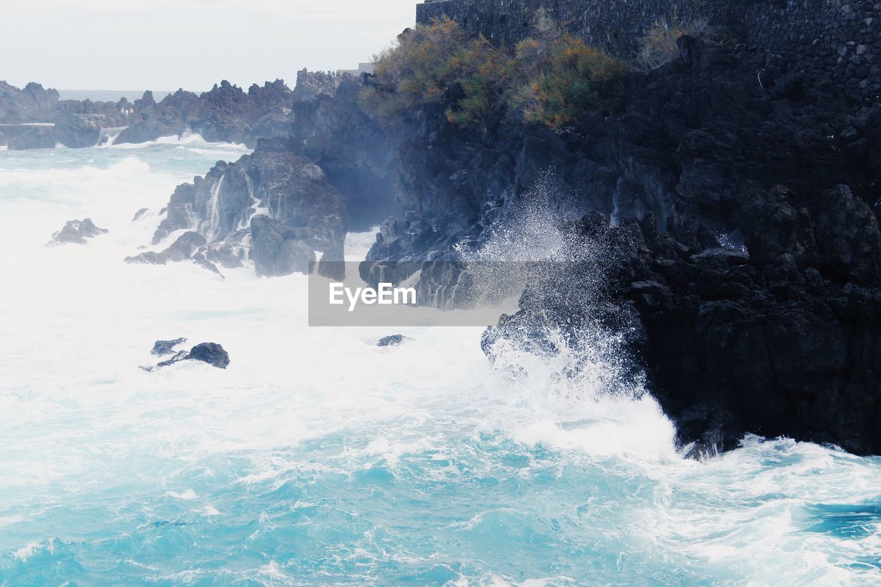 SCENIC VIEW OF WATERFALL