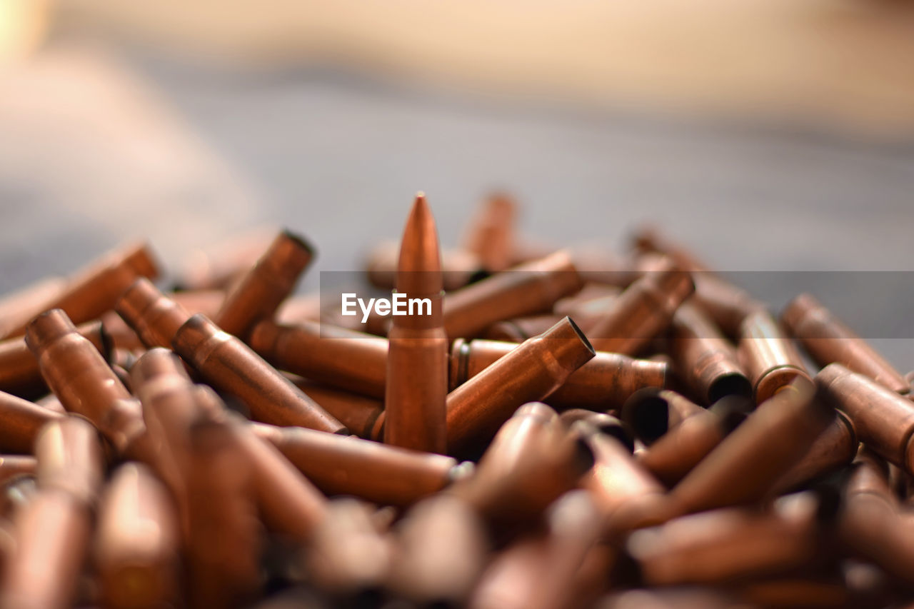 Close-up of bullets on table