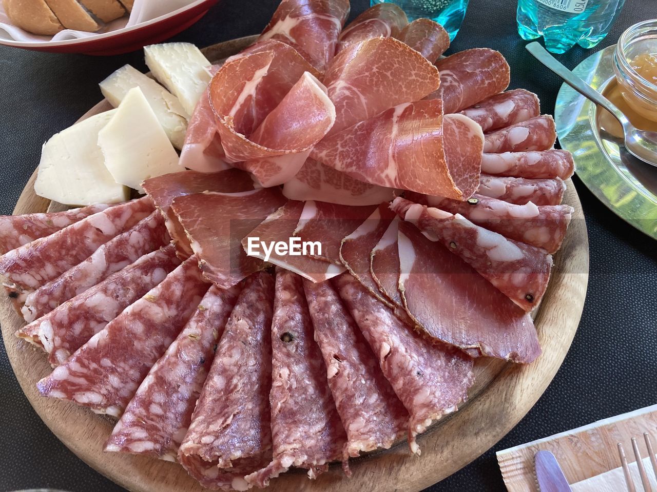 food and drink, food, meat, freshness, dish, prosciutto, jamón serrano, table, high angle view, samgyeopsal, kobe beef, no people, ham, indoors, still life, meal, pork, plate, processed meat, slice, cuisine, capicola, raw food, healthy eating, close-up