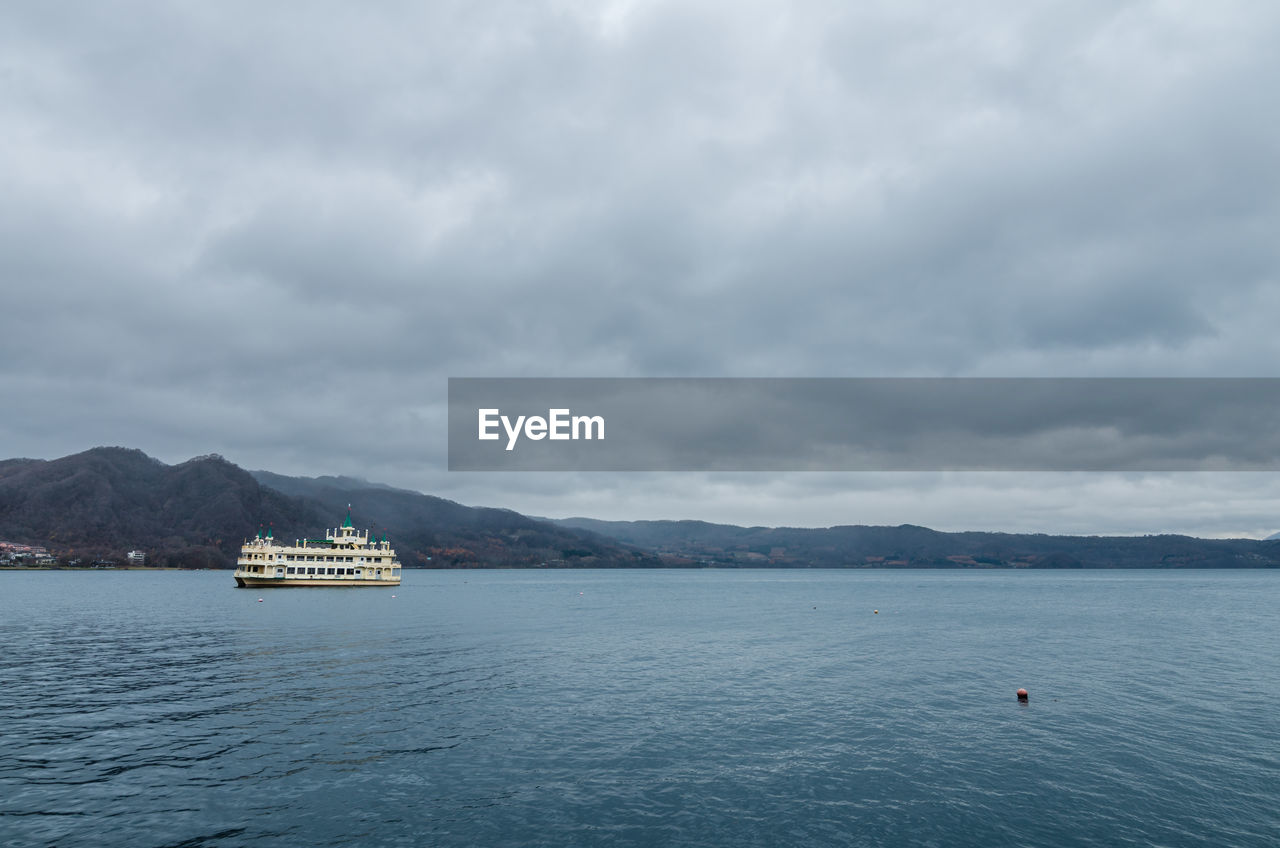 Cloudy view of the infamous lake toya. the lake is a volcanic caldera lake.
