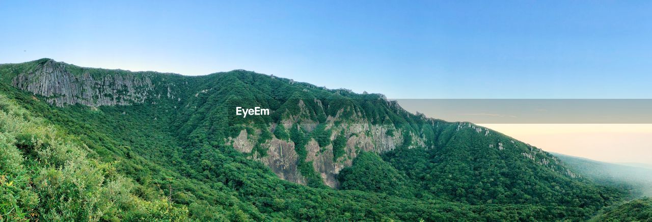 Scenic view of mountains against clear sky