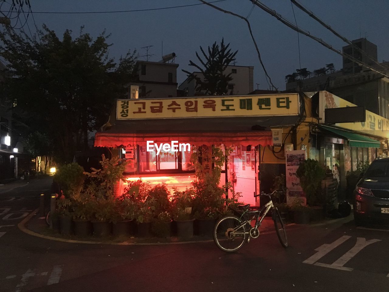 BICYCLES PARKED IN FRONT OF BUILDING