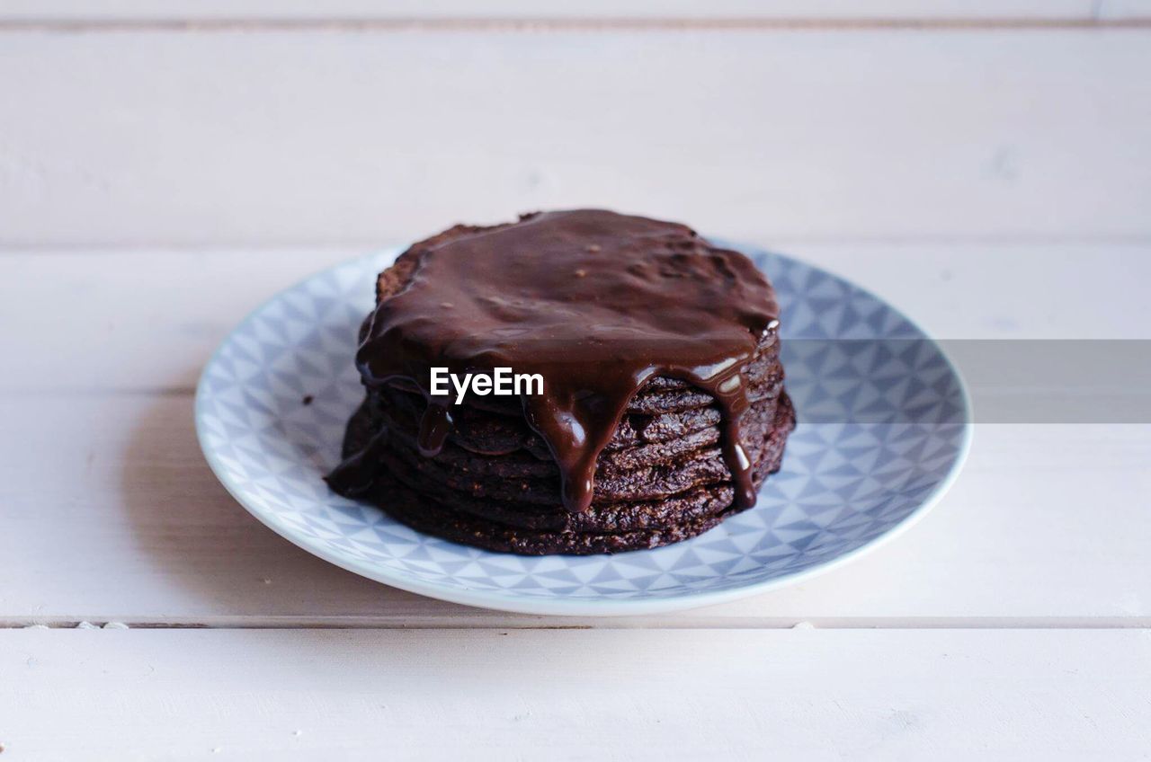 Close-up of chocolate cake in plate on table