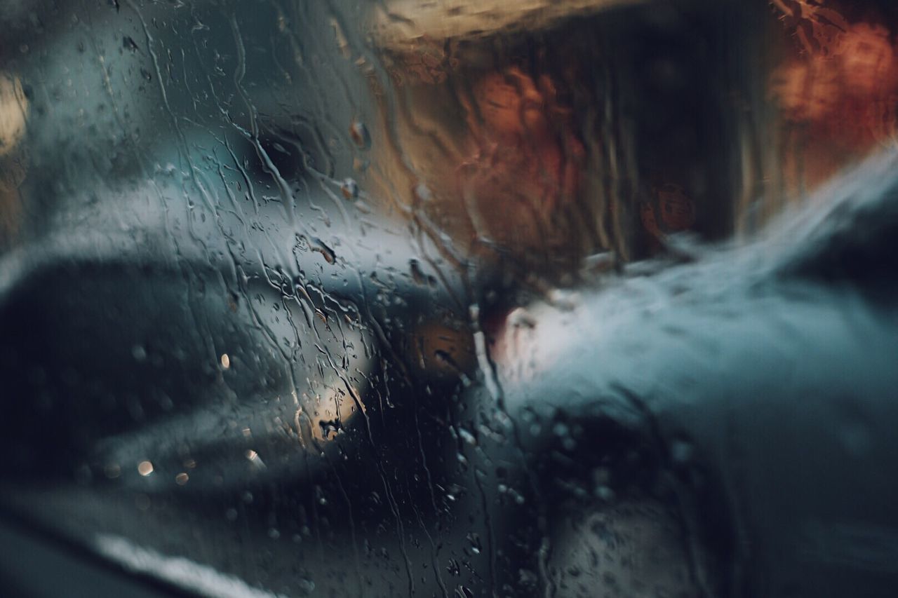 Close-up of wet car window