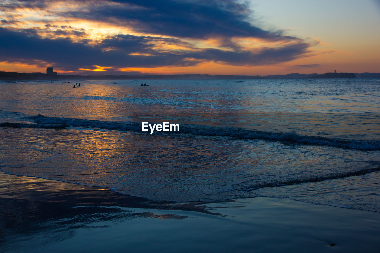 Scenic view of sea against sky during sunset