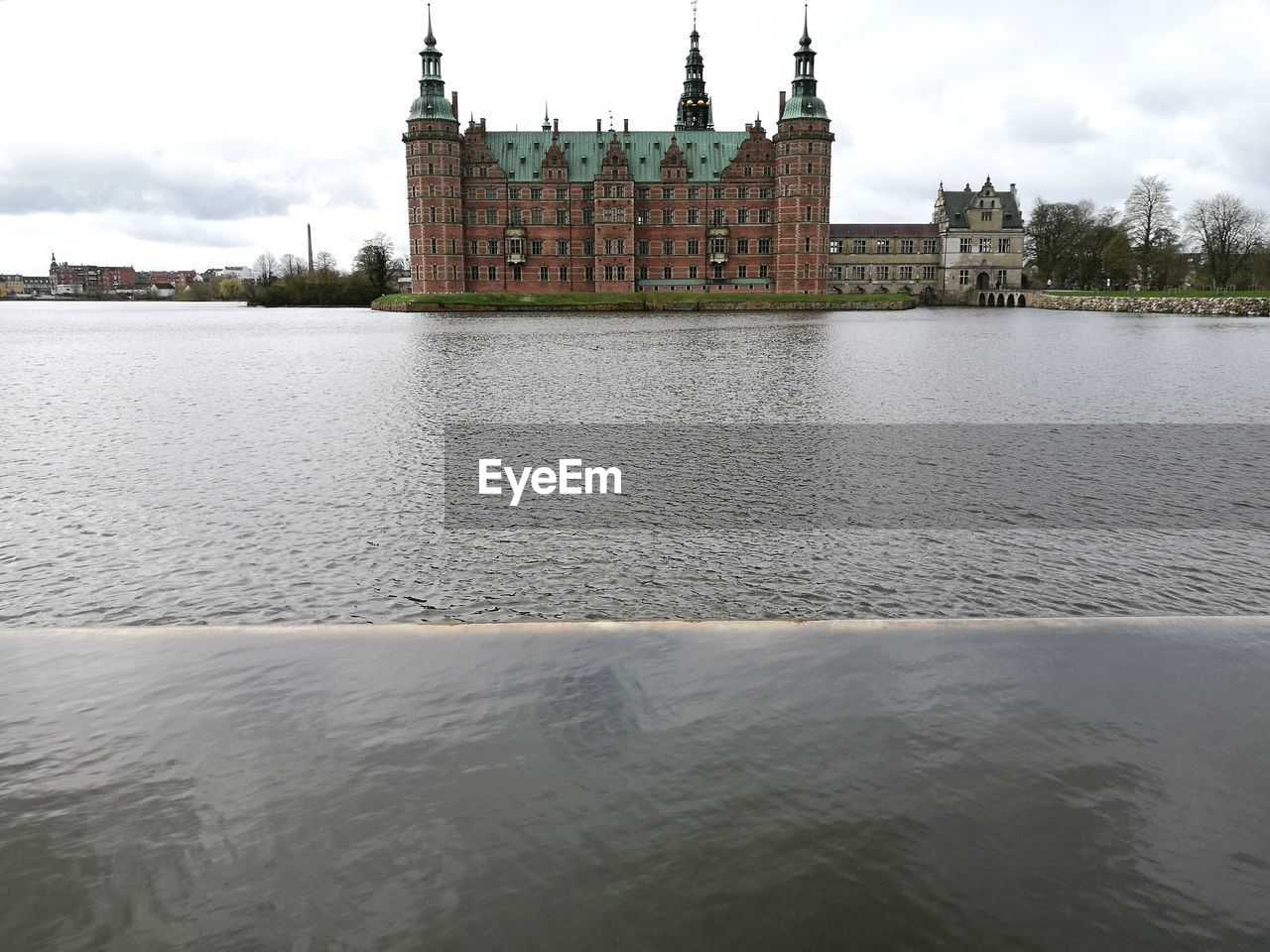 VIEW OF BUILDINGS WITH WATERFRONT