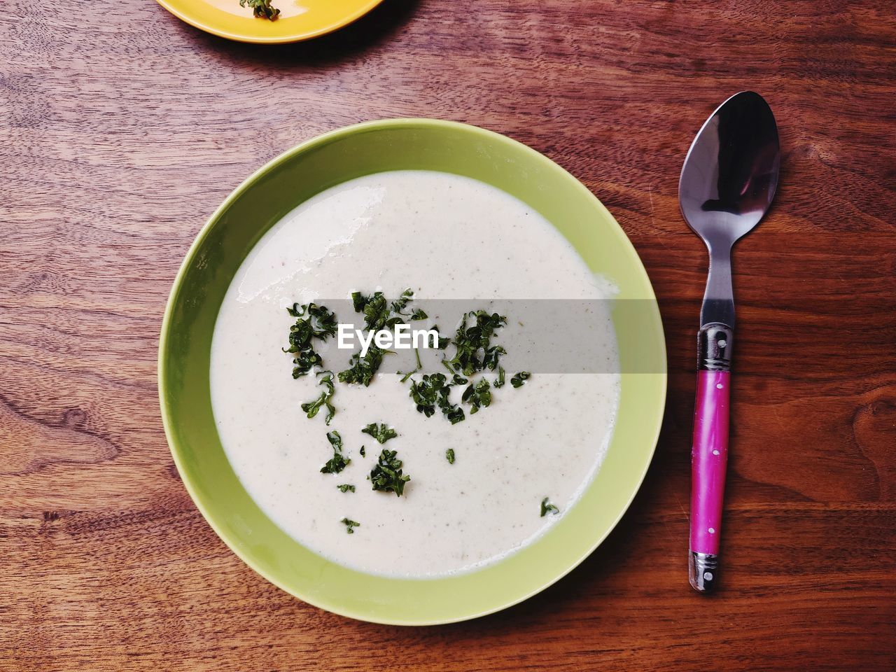 High angle view of broccoli soup on table