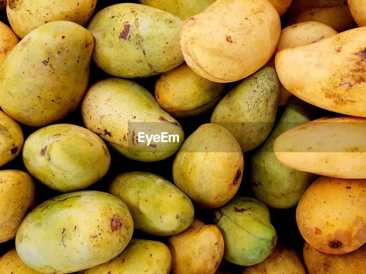 Full frame shot of mangoes in market