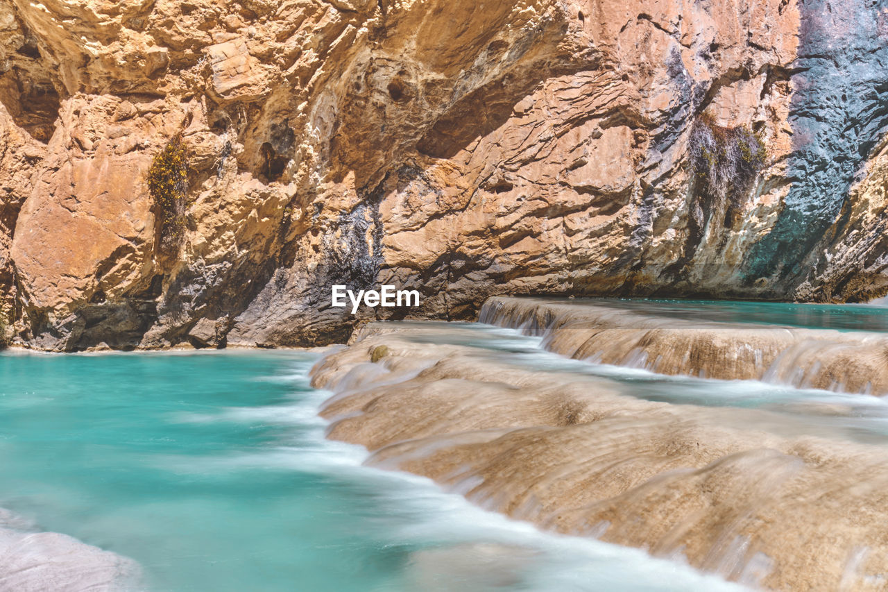 Natural pools of millpu in huancaraylla. turquoise lagoons near ayacucho, travel destination in peru