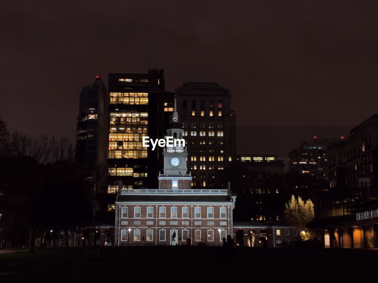 ILLUMINATED BUILDINGS AT NIGHT