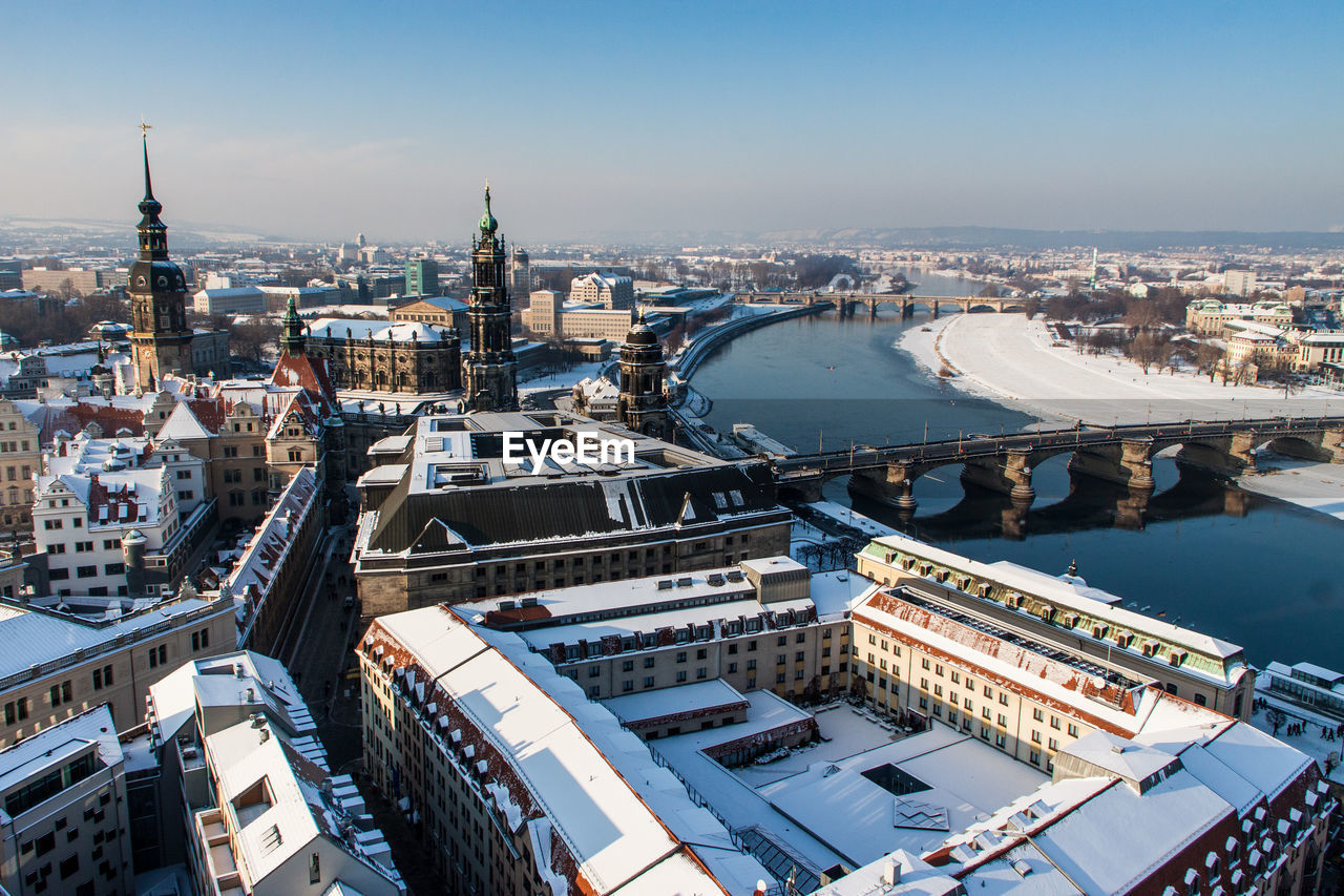 High angle view of cityscape by elbe river during winter