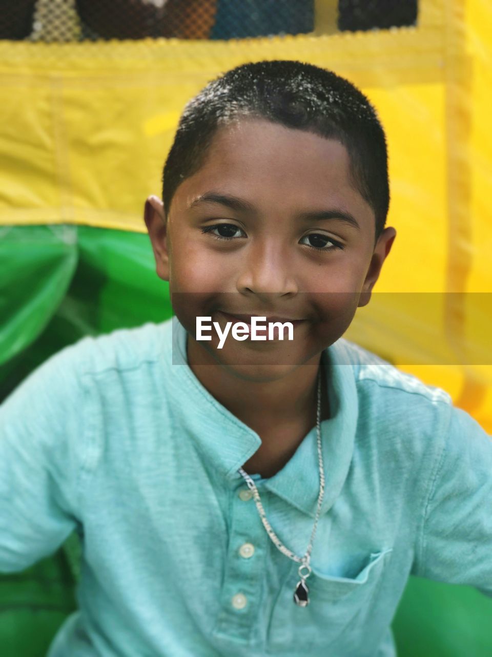 Close-up portrait of smiling boy