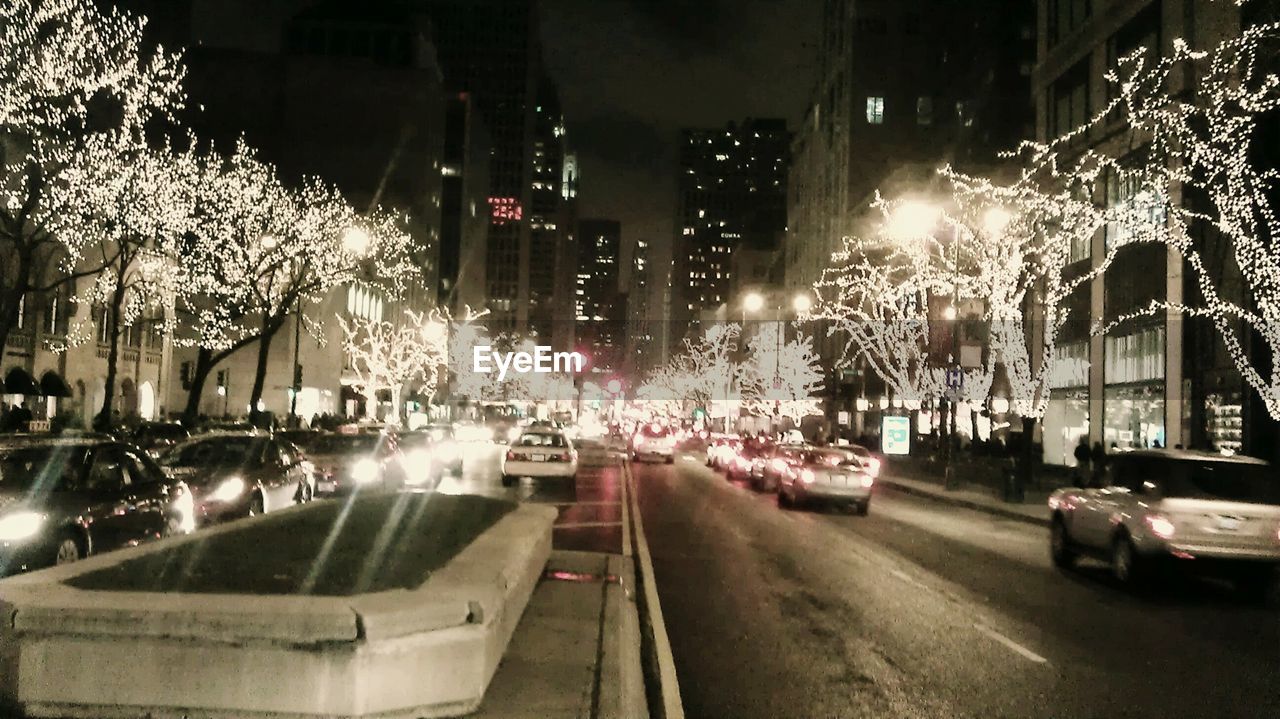 ILLUMINATED STREET LIGHT AT NIGHT