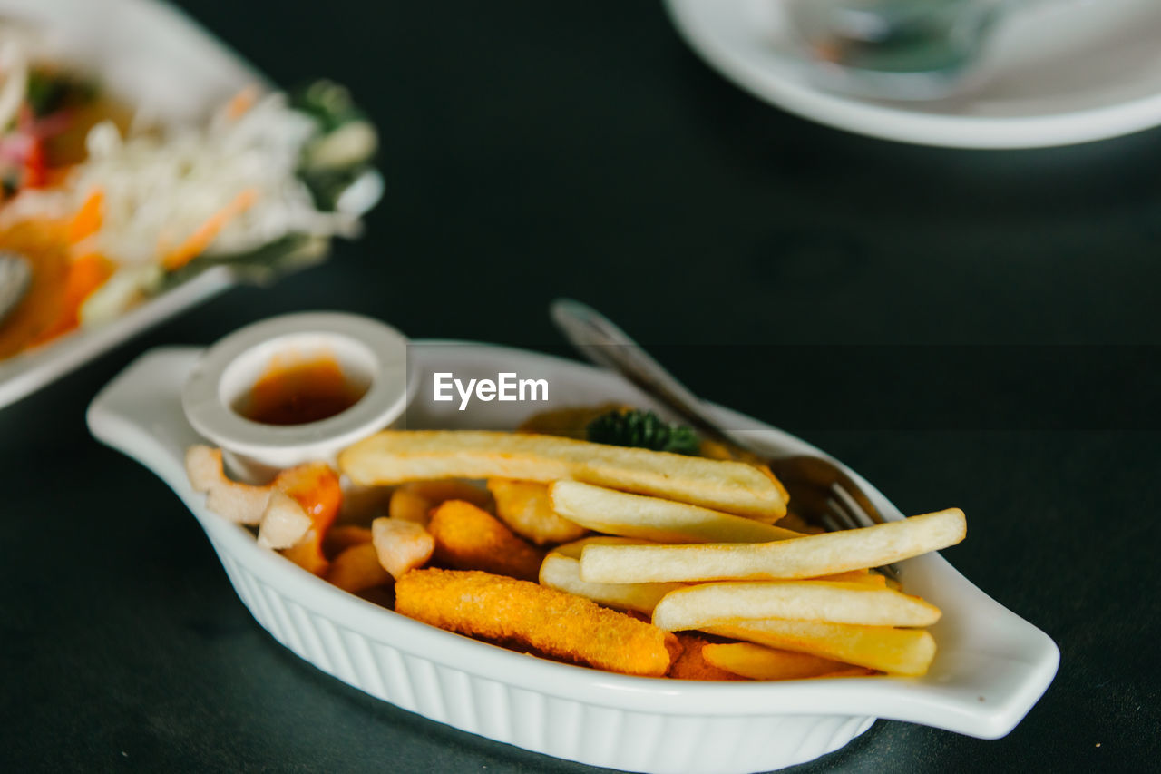 Close-up of food in plate on table