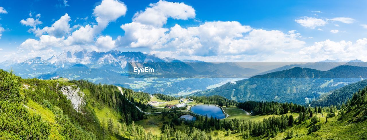 Panoramic view of landscape against cloudy sky