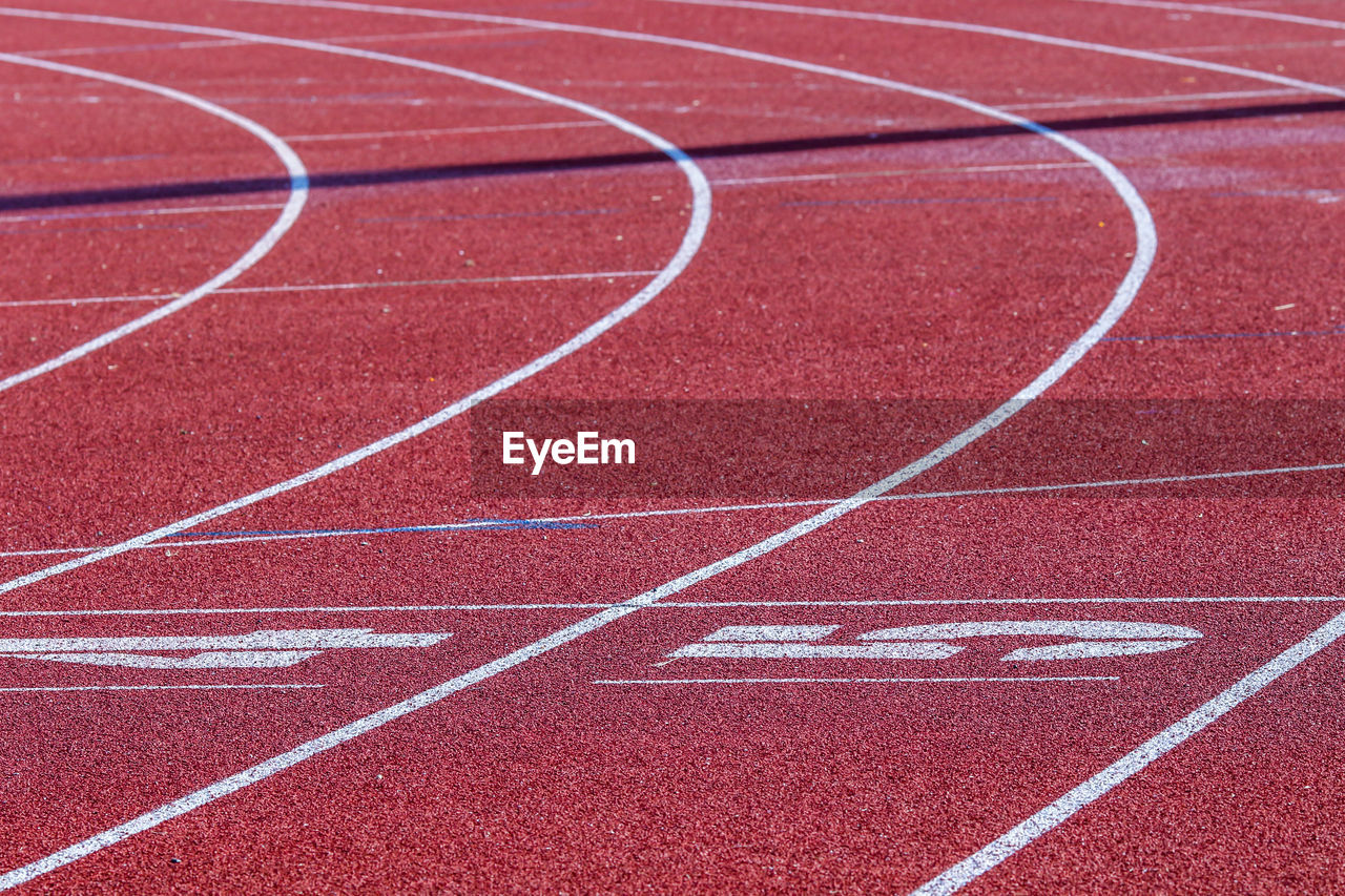 High angle view of numbers on running track in stadium