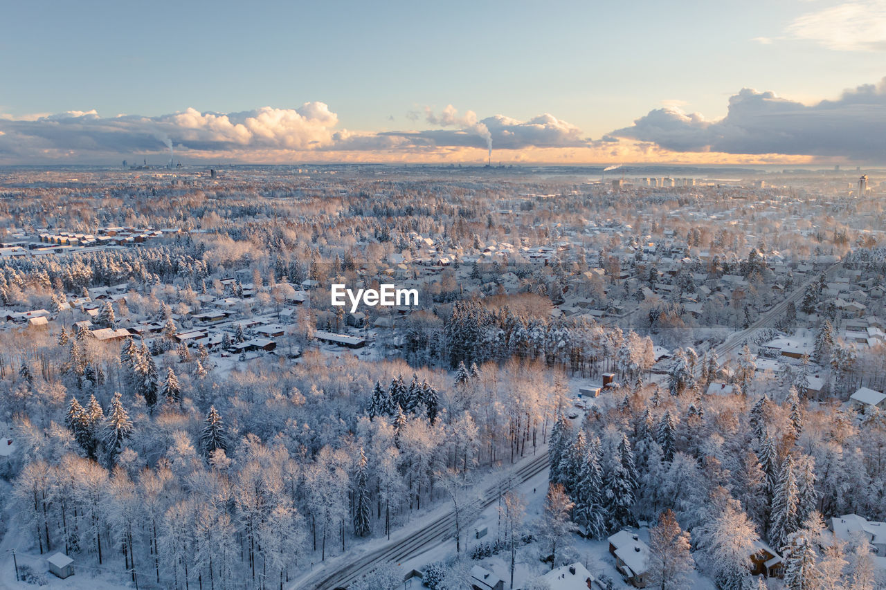 Suburban view from above with small houses and snow in espoo, finland