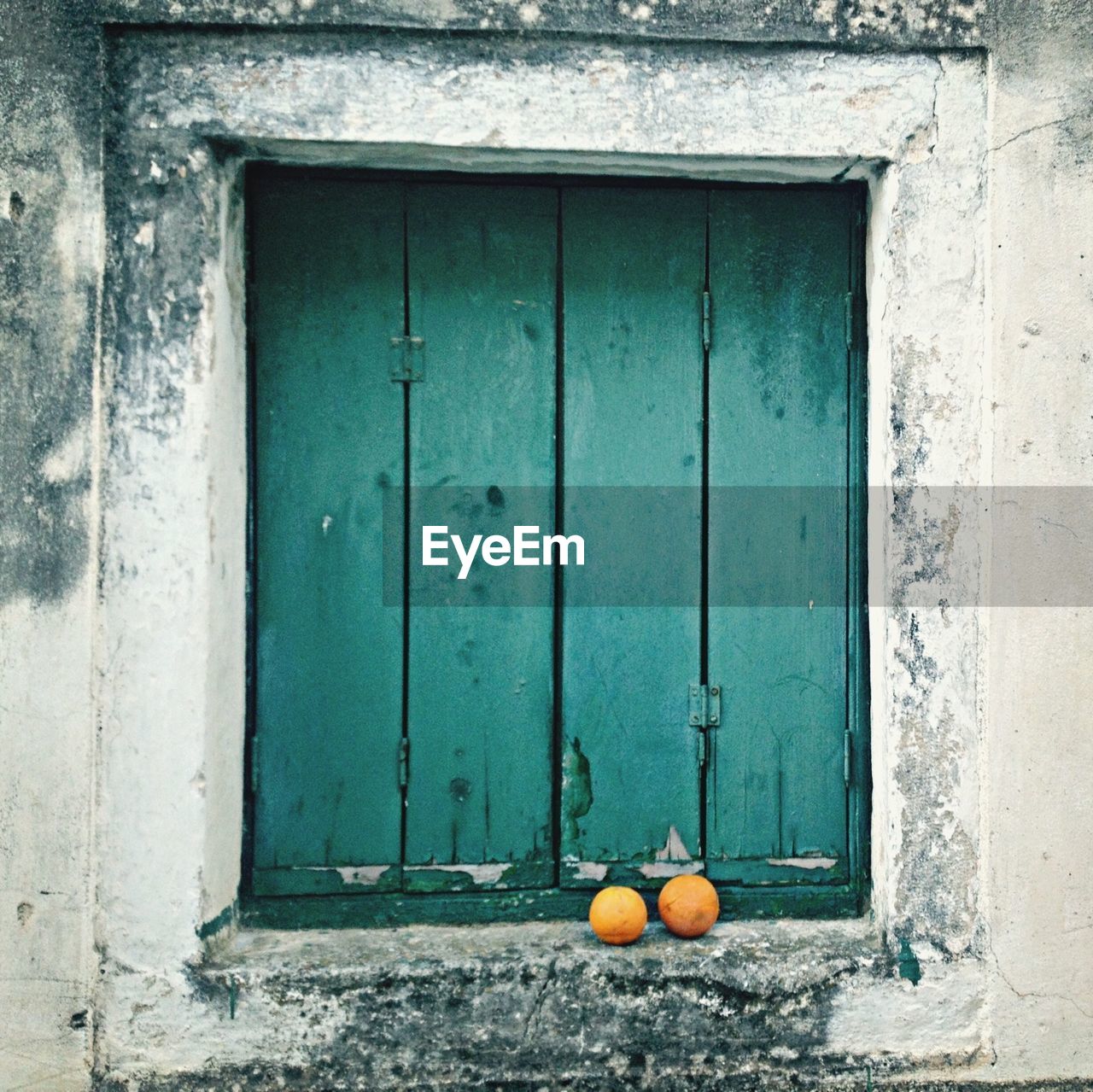 Closed wooden windows of house