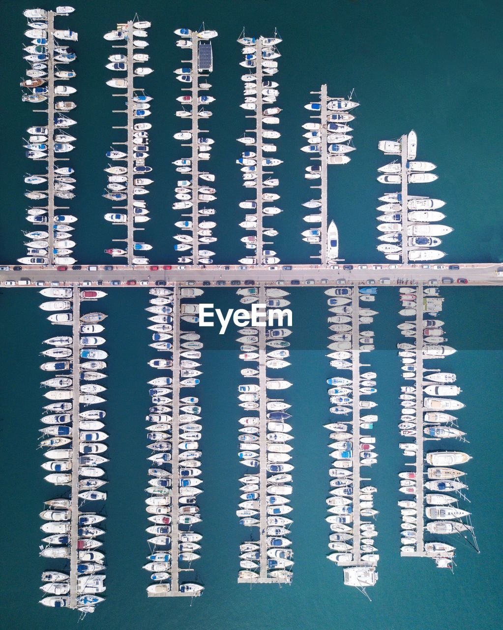 High angle view of boats moored at harbor