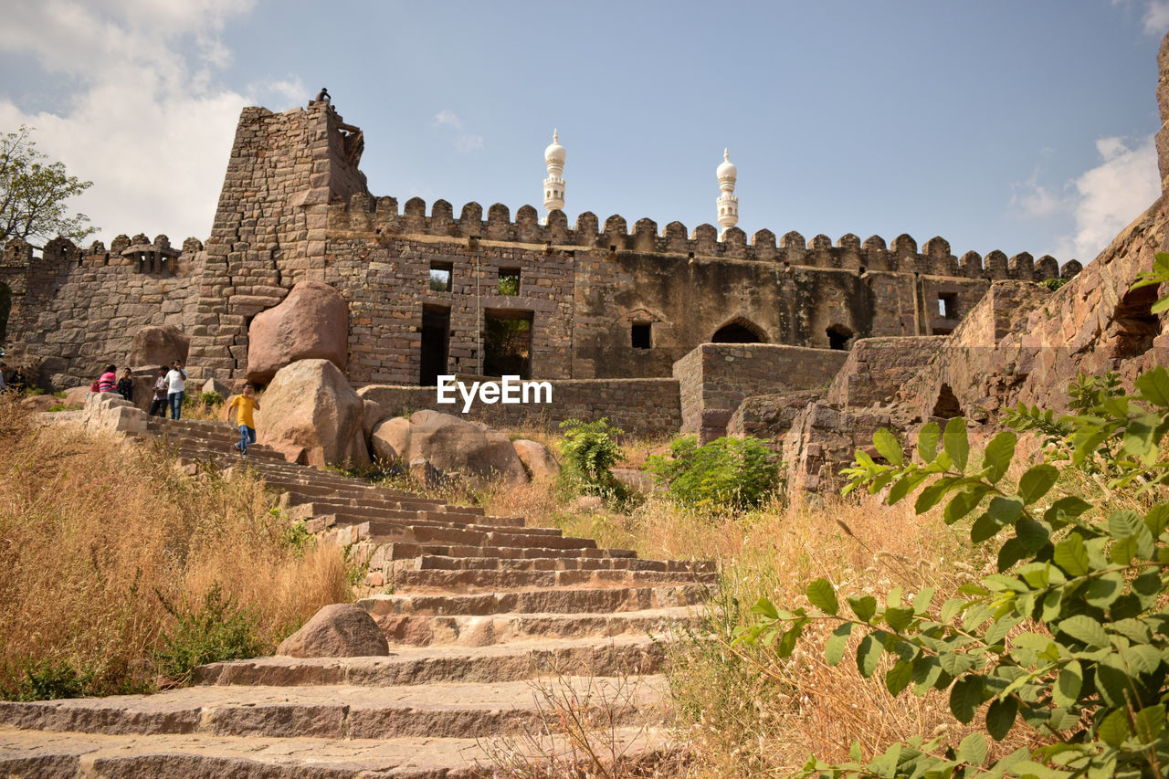 Old ruins of building against sky