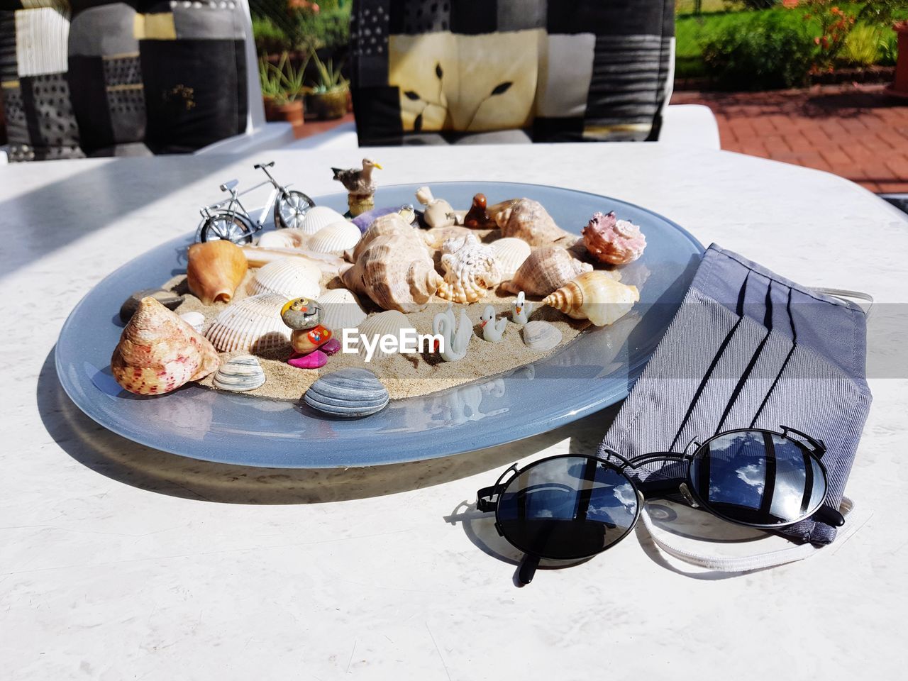 HIGH ANGLE VIEW OF FOOD ON TABLE IN YARD