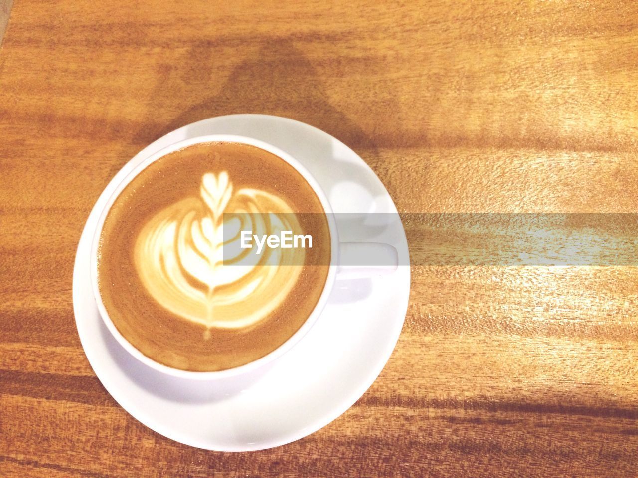 Close-up of cappuccino on table