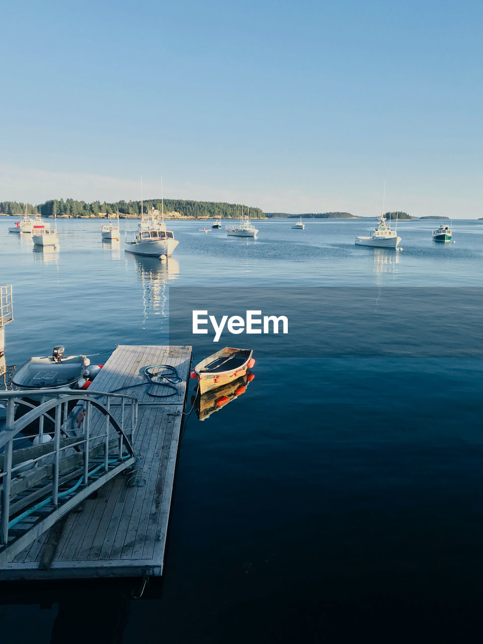 boats in sea against sky