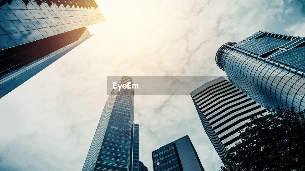 Low angle view of modern buildings against sky