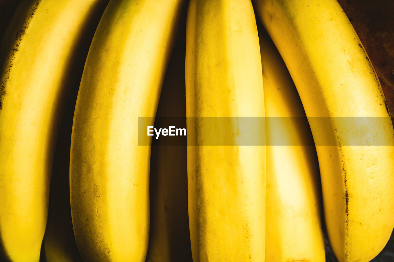 FULL FRAME SHOT OF YELLOW FRUIT