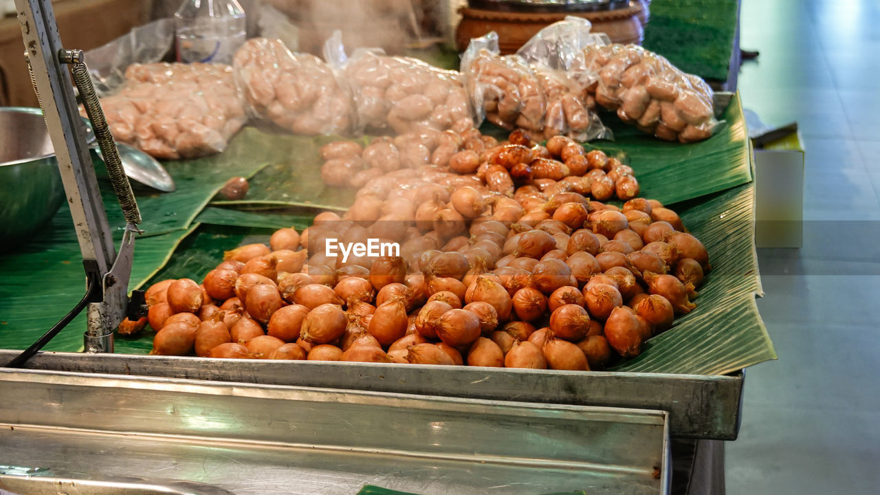 MEAT FOR SALE AT MARKET STALL