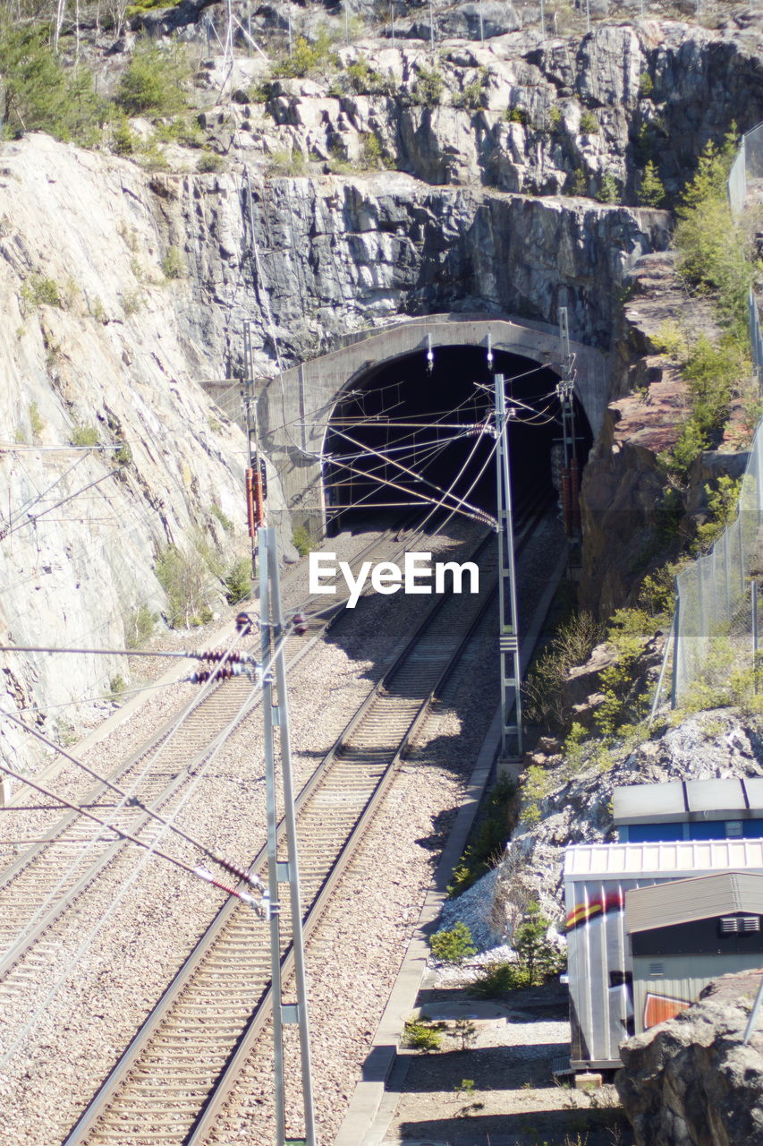 BUILT STRUCTURE ON ROCK AGAINST BRIDGE