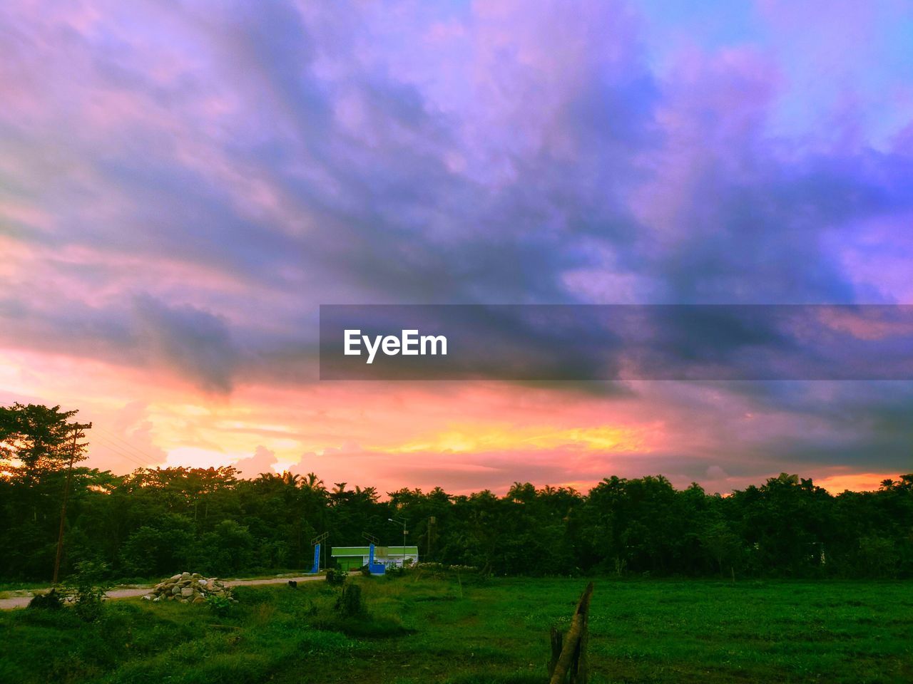 SCENIC VIEW OF LANDSCAPE AGAINST SKY DURING SUNSET