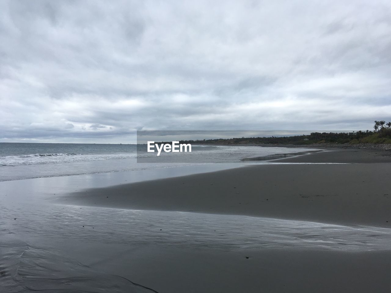 VIEW OF BEACH AGAINST SKY