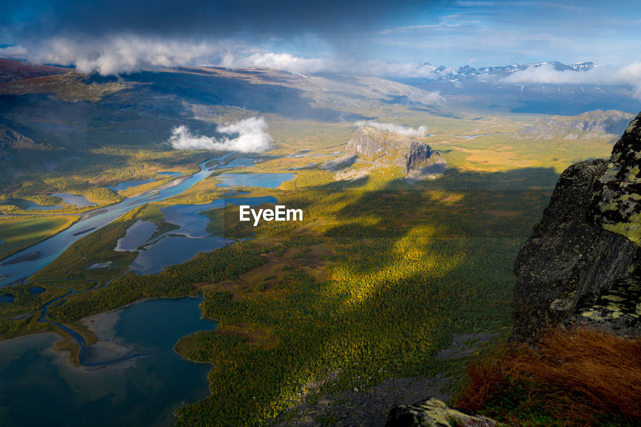 Beautiful, wild arctic valley viewed from mountain top in epic early morning light. 