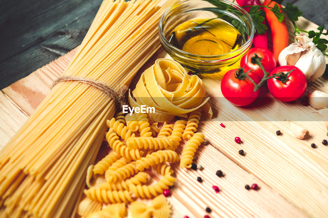 HIGH ANGLE VIEW OF VARIOUS FOOD ON TABLE