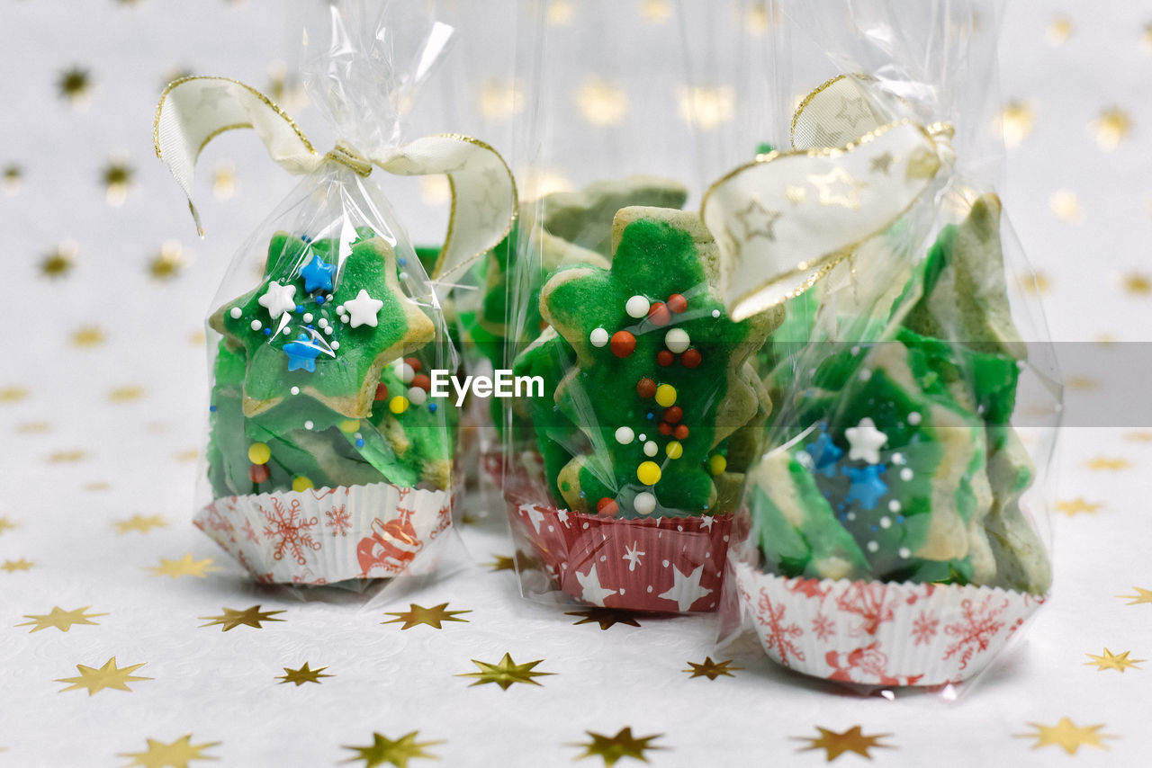 Close-up of multi colored gingerbread cookies on table