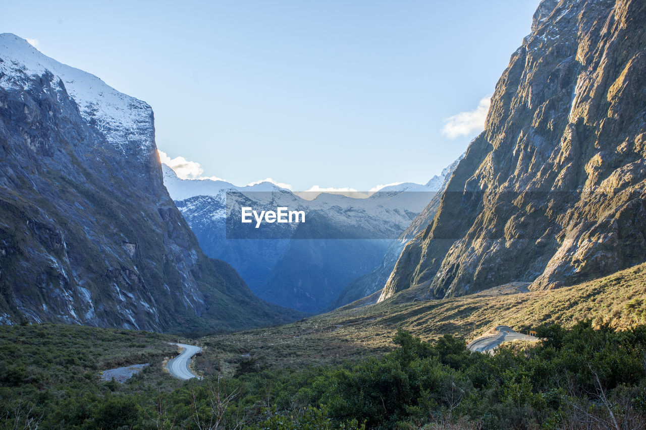 Scenic view of snowcapped mountains against sky