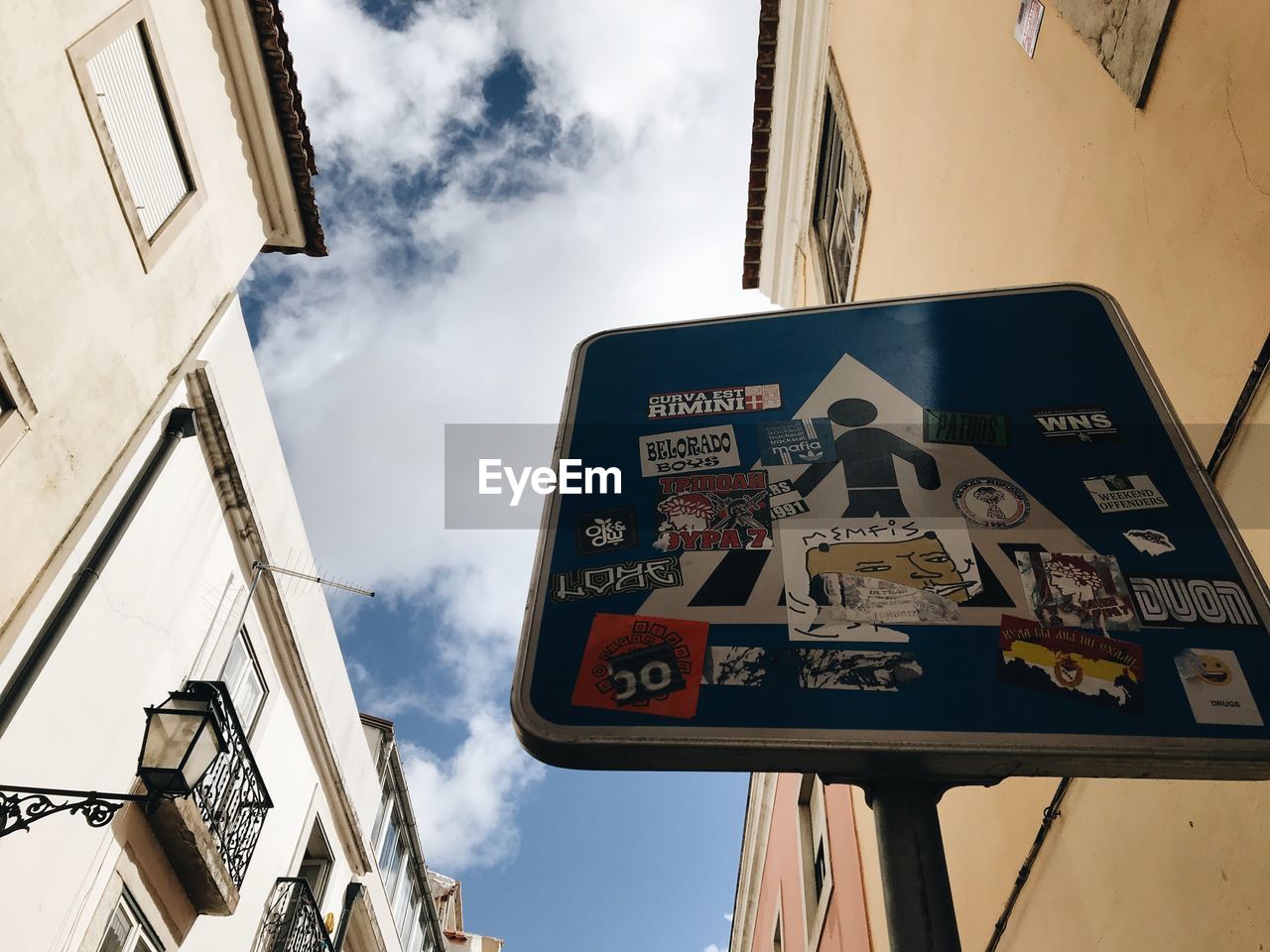 LOW ANGLE VIEW OF SIGN AGAINST SKY