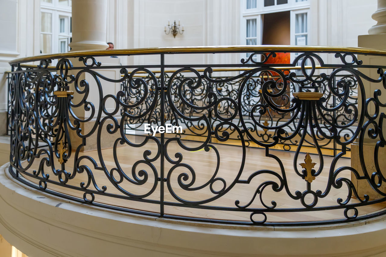 iron, architecture, railing, baluster, handrail, built structure, home, residential district, wrought iron, mansion, ornate, building exterior, building, house, home interior, staircase, luxury, no people, pattern, wealth, window, elegance, spiral, steps and staircases, metal, architectural feature, decoration, balcony, home showcase interior