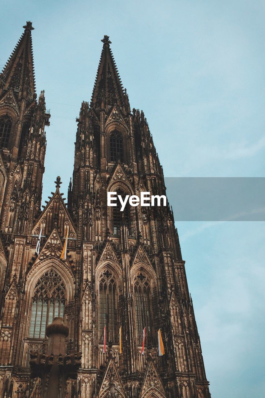 Low angle view of cologne cathedral against sky