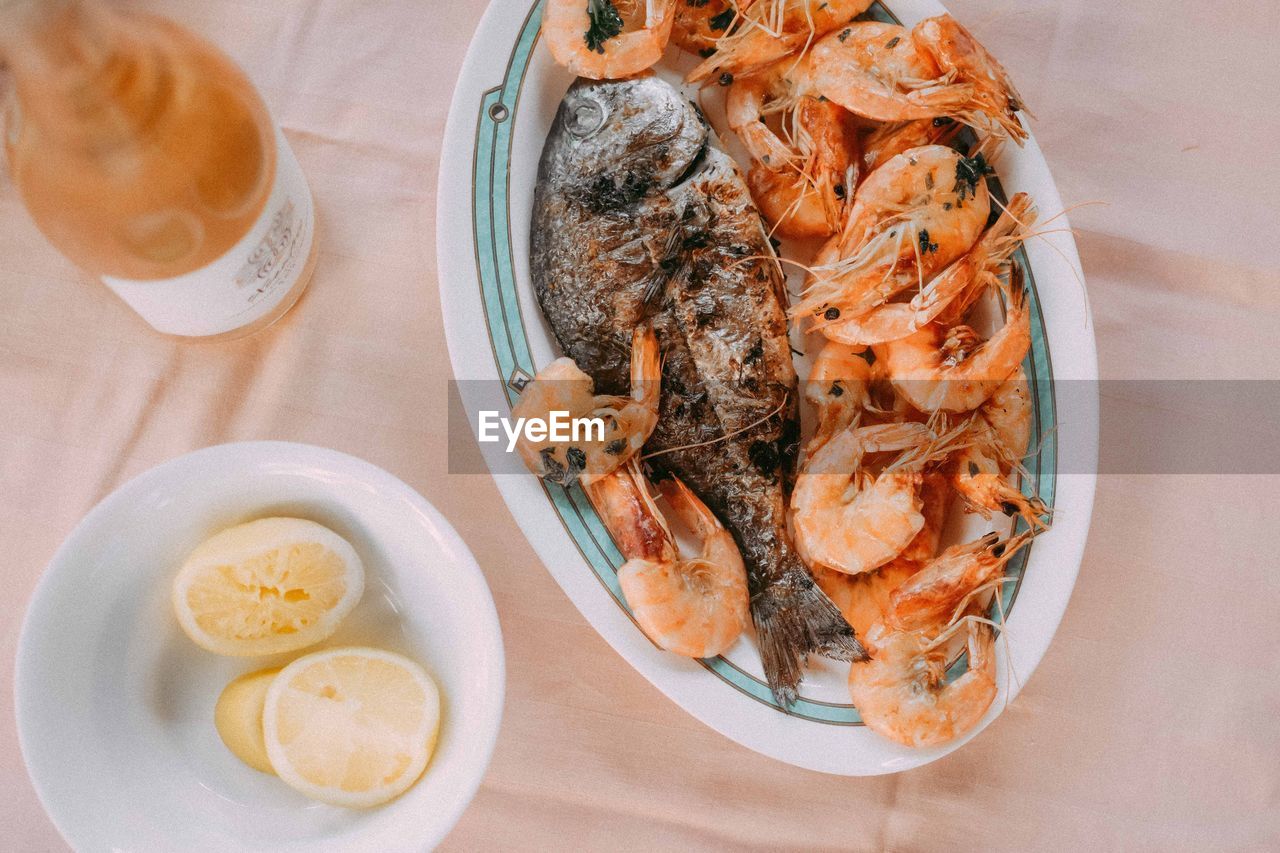 Directly above shot of seafood in plate on table